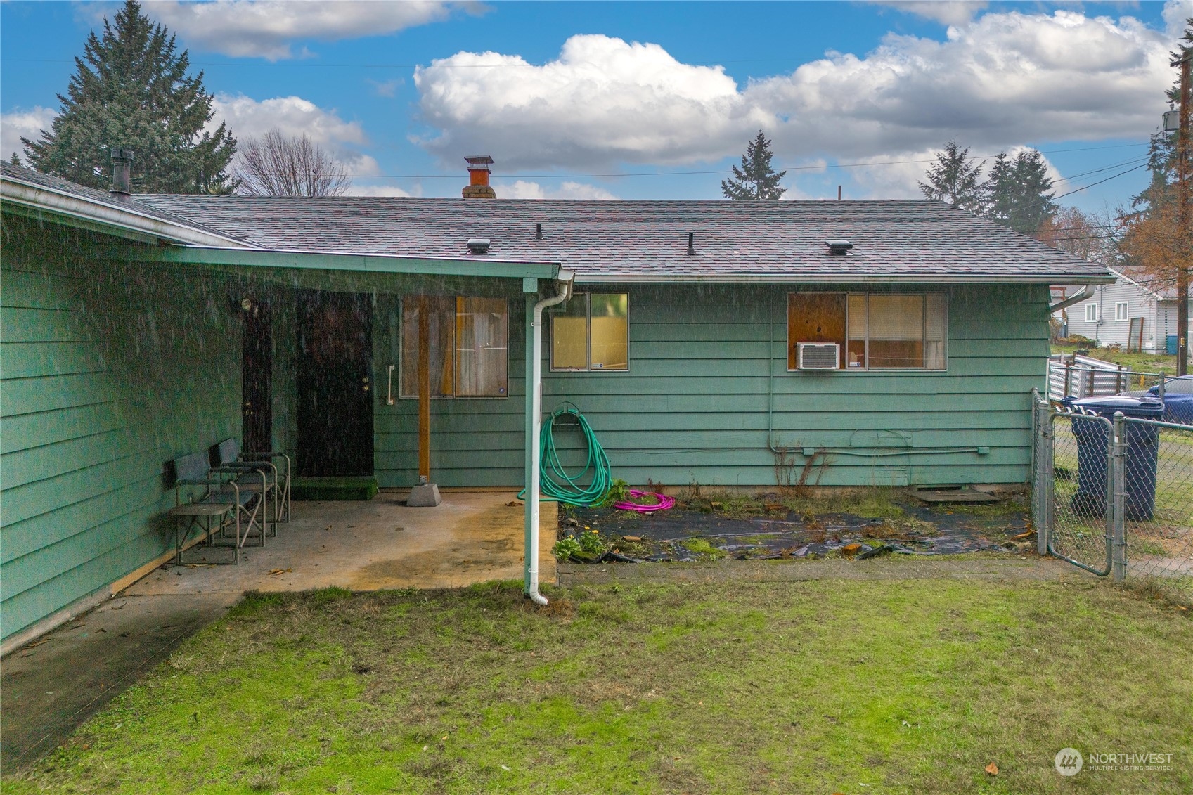 903 Southwest 104th Street Seattle, WA 98146 - Photo 18 of 26 a front view of a house with a yard