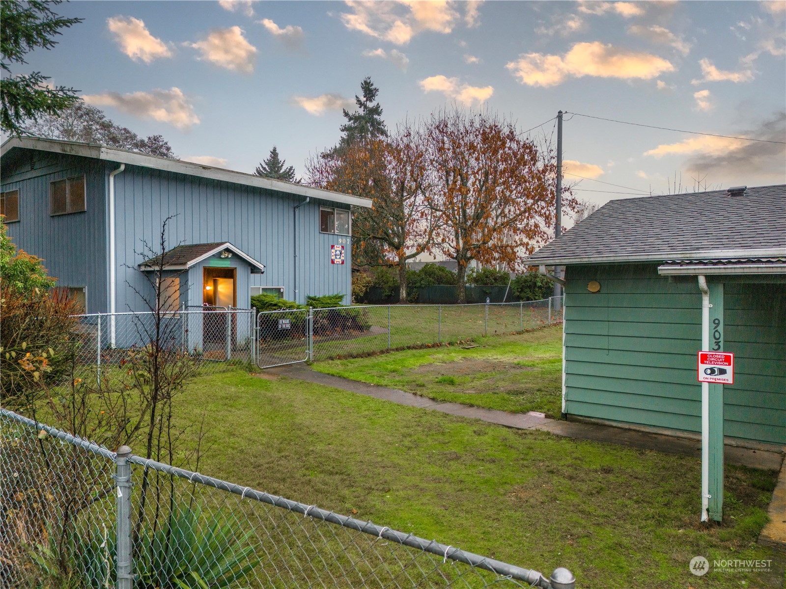 903 Southwest 104th Street Seattle, WA 98146 - Photo 19 of 26 a front view of a house with garden