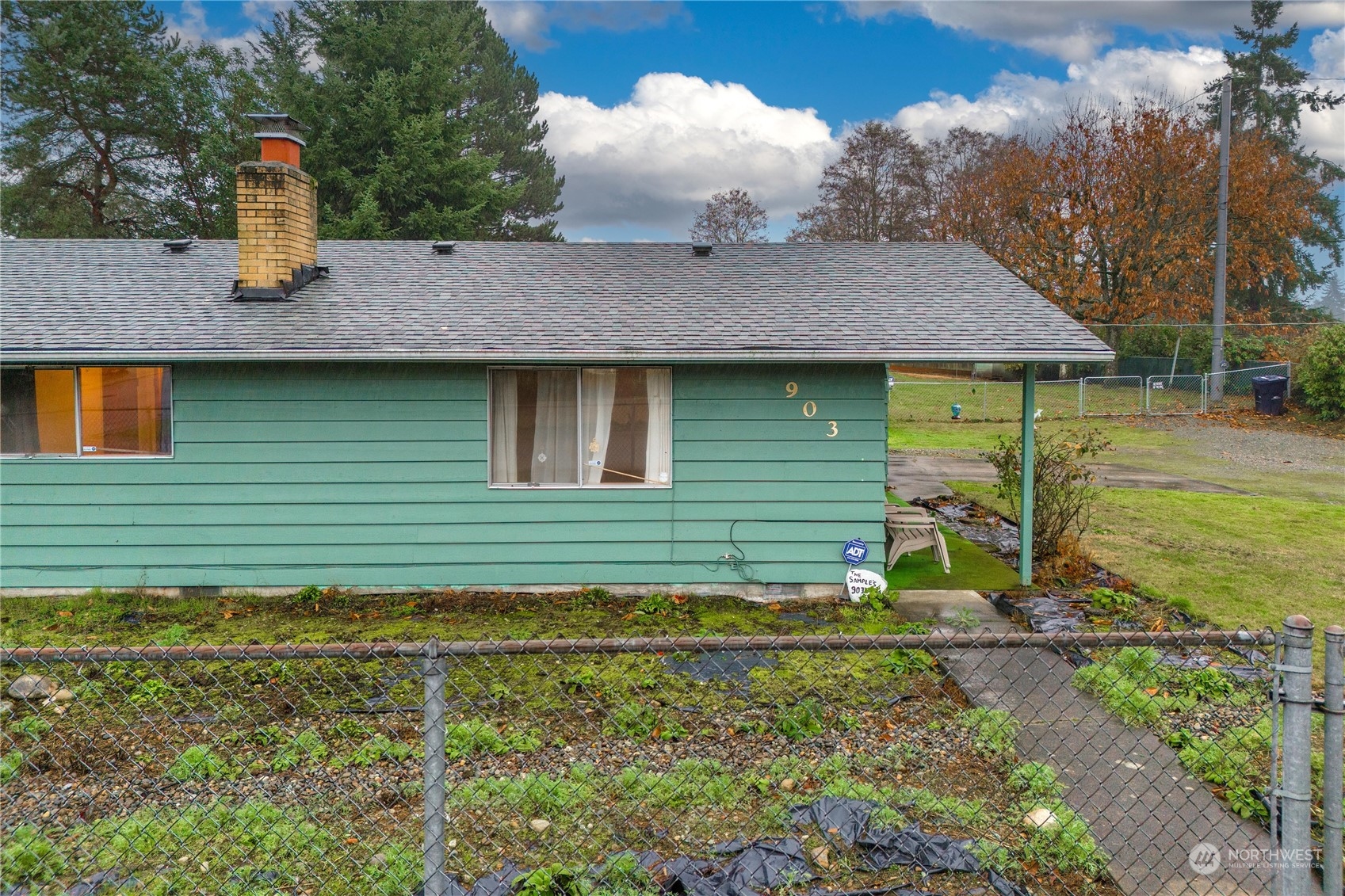 903 Southwest 104th Street Seattle, WA 98146 - Photo 24 of 26 a view of a house with backyard