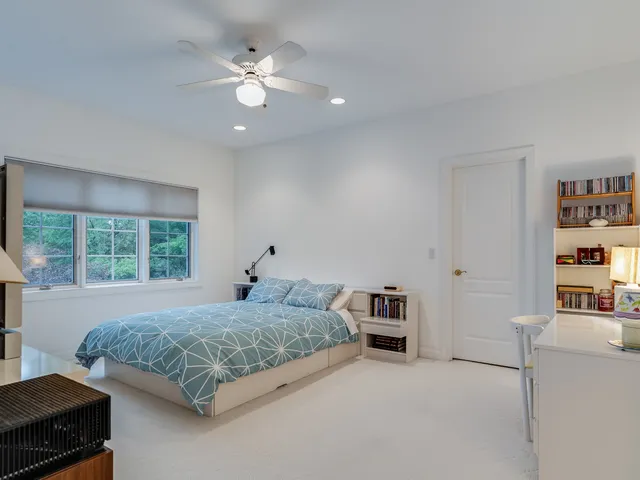 a bathroom with a shower and a toilet