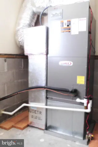 a bathroom with a toilet a sink and a shower