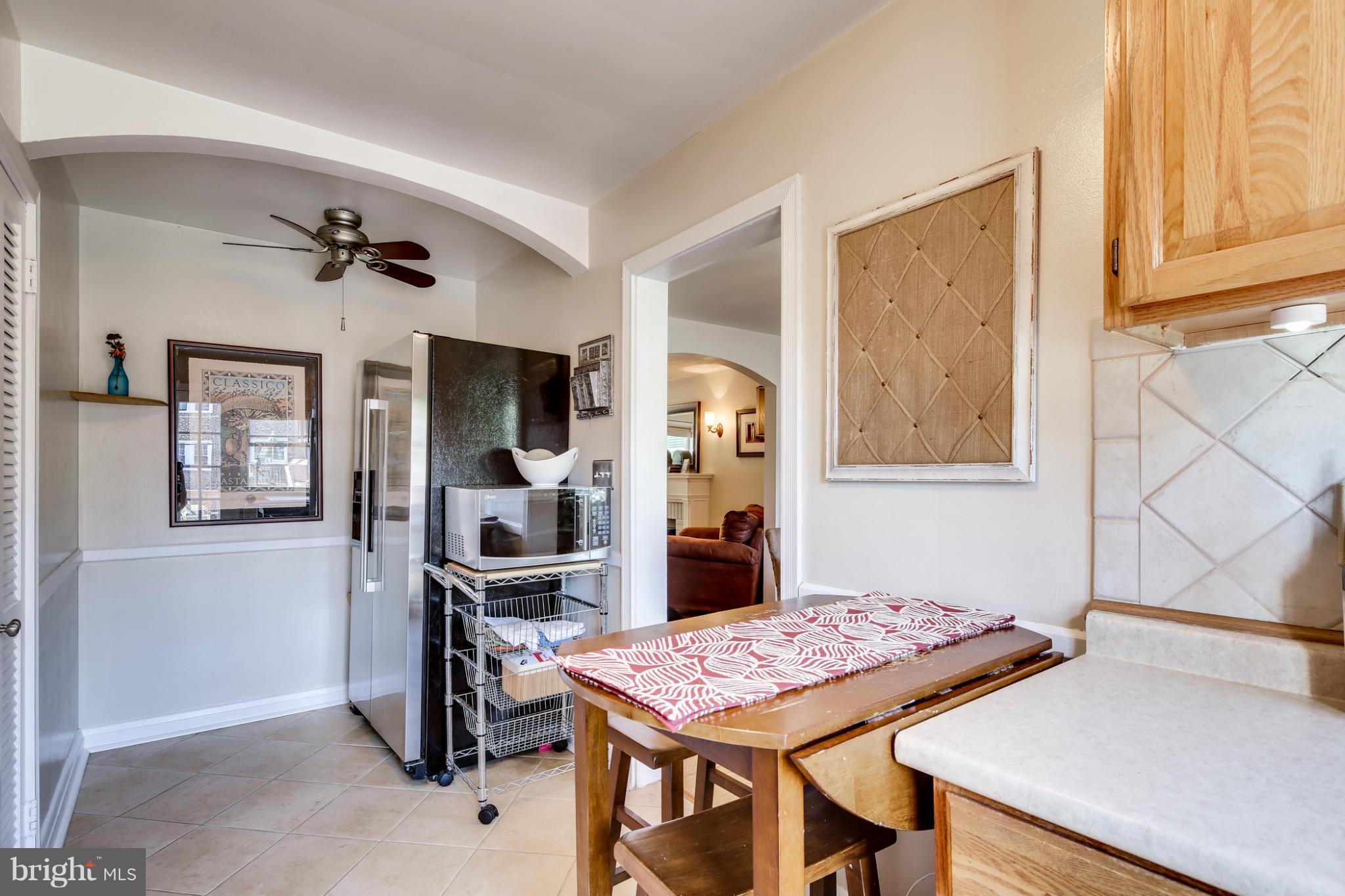 431 Academy Road Catonsville, MD 21228 - Photo 8 of 30 a view of a dining room with furniture