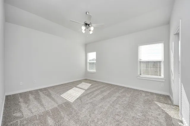 a bathroom with a granite countertop sink mirror and double
