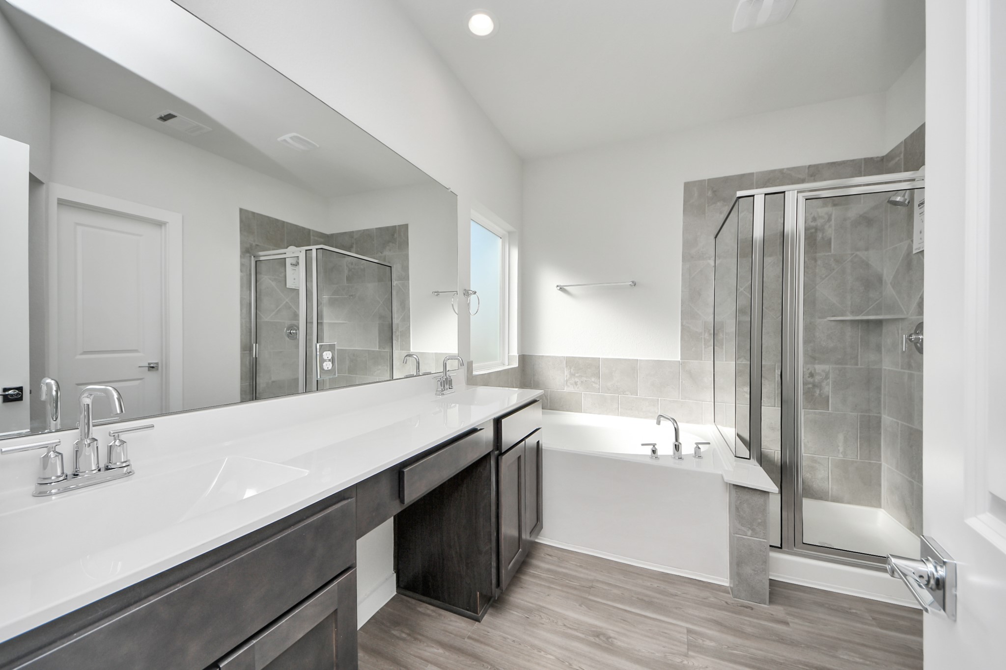 21507 Indigo Ruth Drive Spring, TX 77379 - Photo 20 of 33 a bathroom with a granite countertop sink mirror and double
