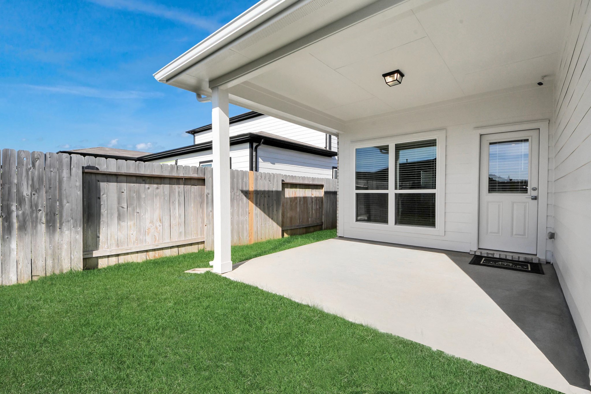 21507 Indigo Ruth Drive Spring, TX 77379 - Photo 26 of 33 a view of a backyard with a garden and deck
