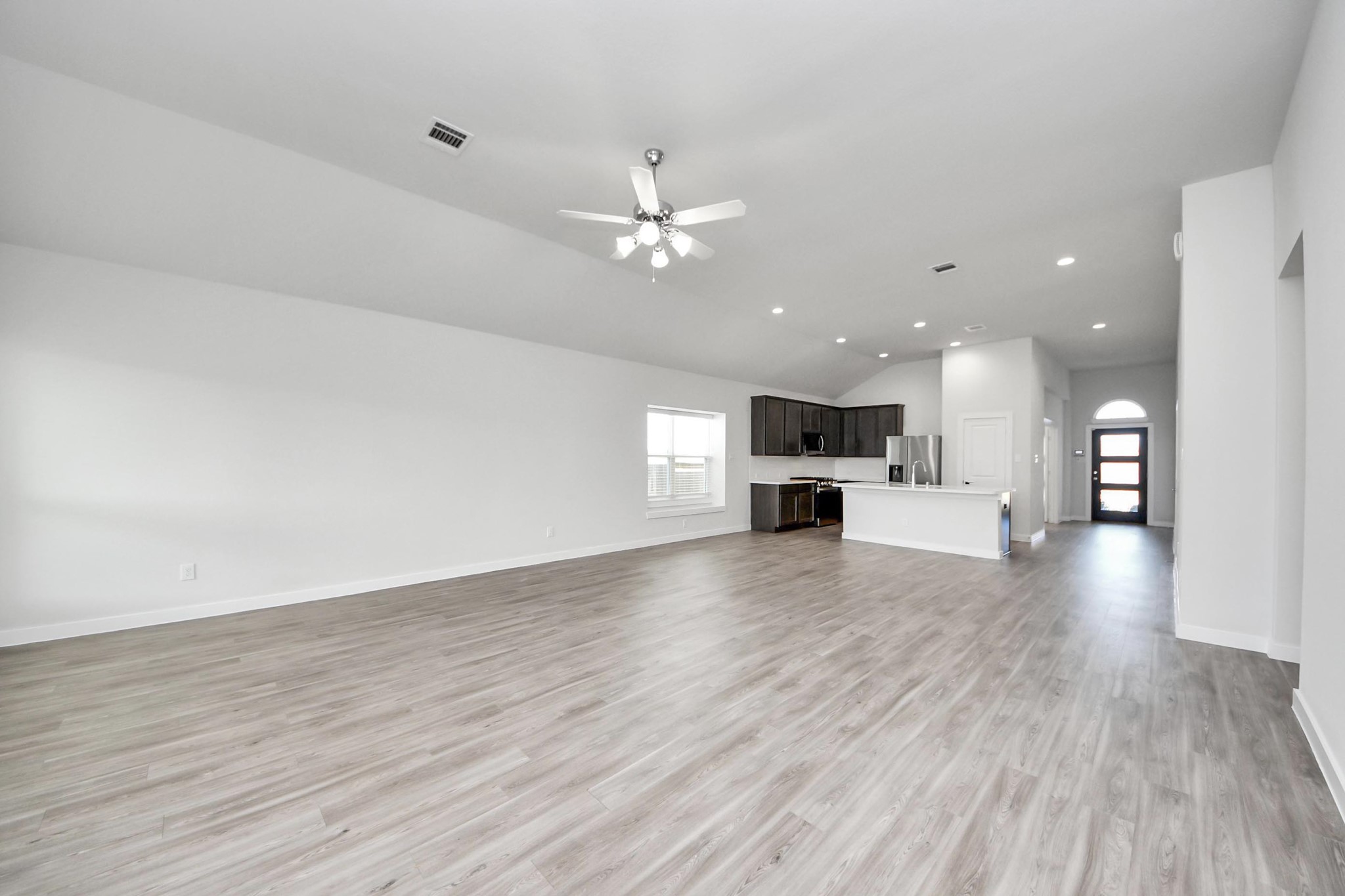 21507 Indigo Ruth Drive Spring, TX 77379 - Photo 10 of 33 a view of kitchen with furniture and wooden floor