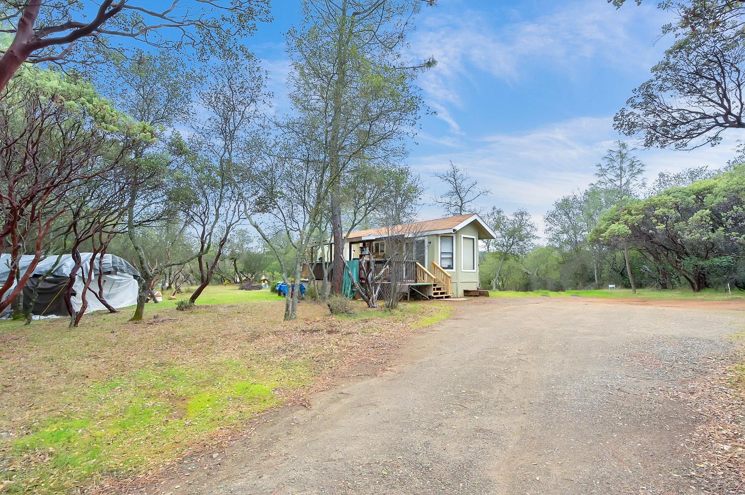 13376 Rue Montaigne Oregon House, CA 95962 - Photo 32 of 45 a view of a house with a yard and sitting area