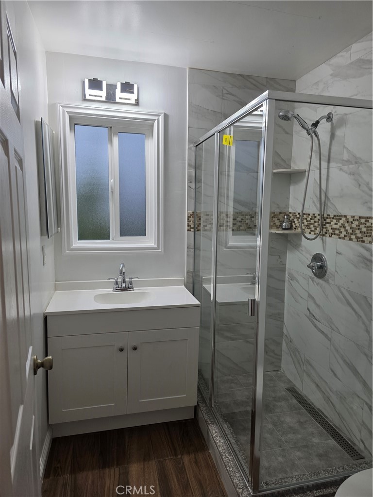 508 Sharon Road Arcadia, CA 91007 - Photo 6 of 10 a bathroom with a shower sink and mirror