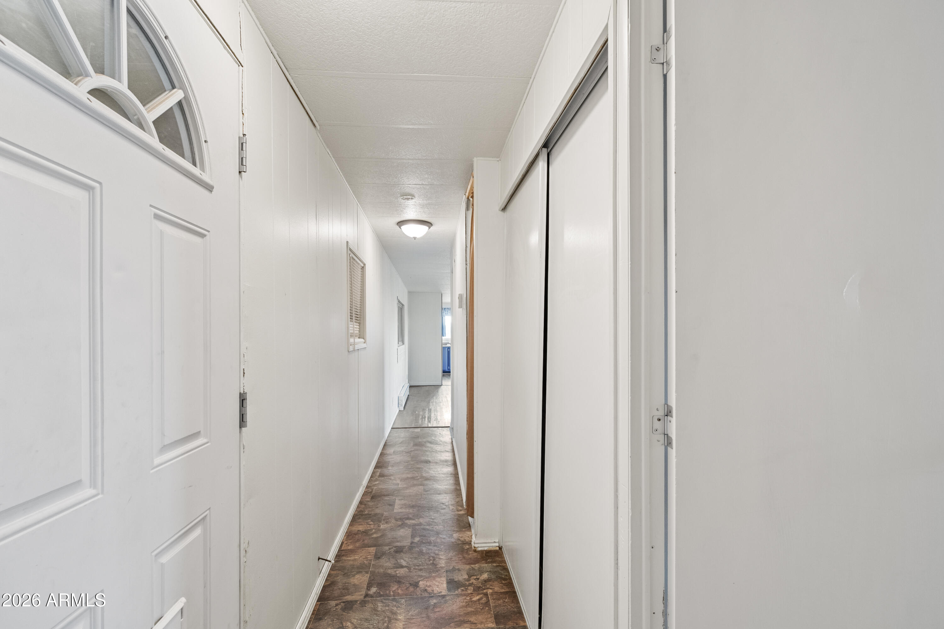 2385 County Line Circle Ash Fork, AZ 86320 - Photo 10 of 35 a view of a hallway with white walls