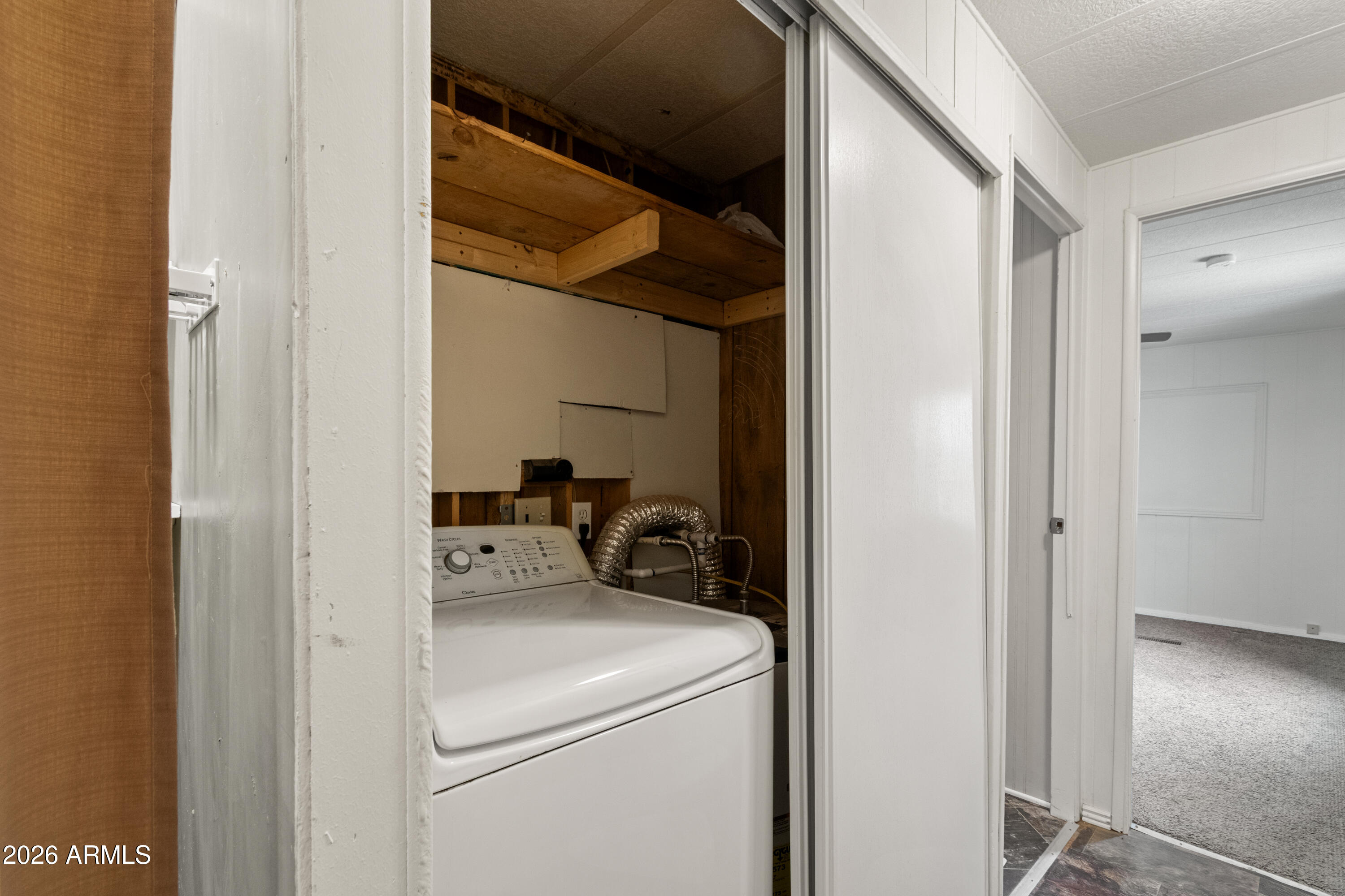 2385 County Line Circle Ash Fork, AZ 86320 - Photo 20 of 35 a utility room with dryer and washer