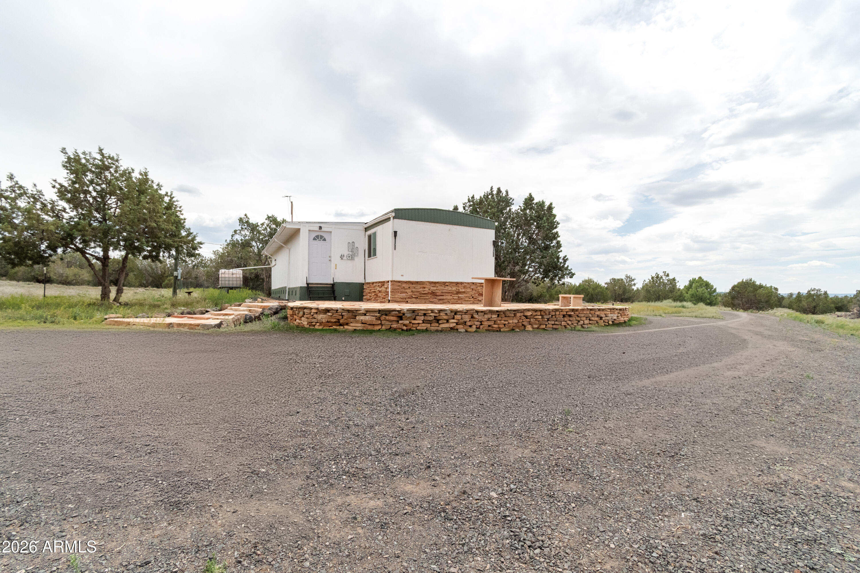 2385 County Line Circle Ash Fork, AZ 86320 - Photo 21 of 35 a view of a town with large trees