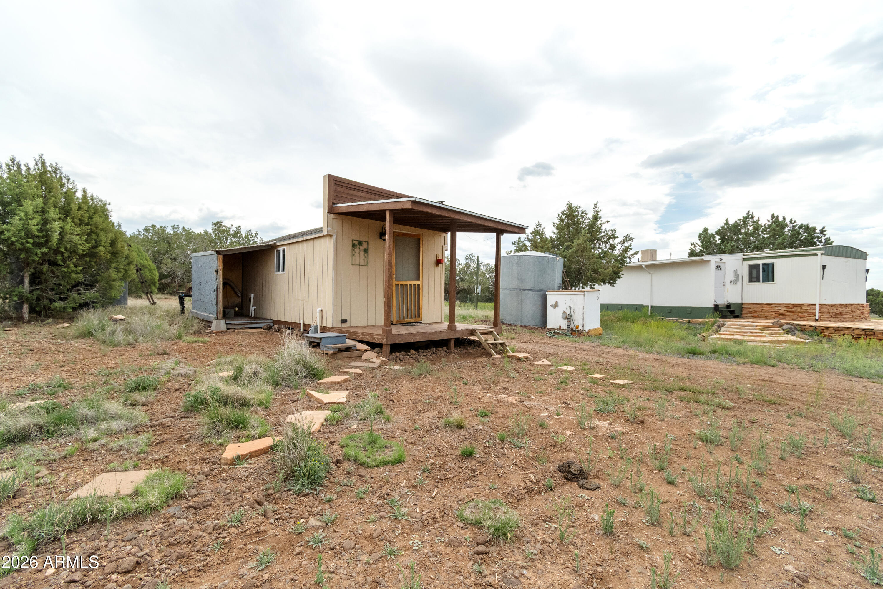 2385 County Line Circle Ash Fork, AZ 86320 - Photo 24 of 35 a view of a house with backyard