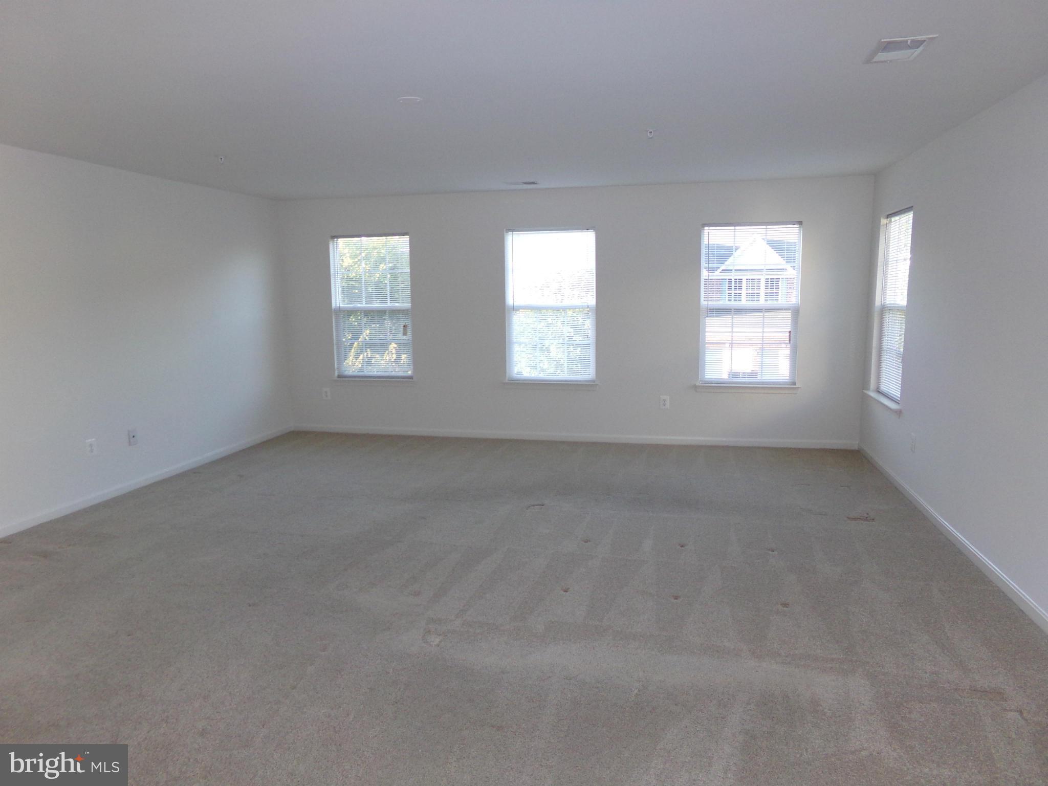 9834 Farm Pond Road Laurel, MD 20708 - Photo 22 of 30 an empty room with windows