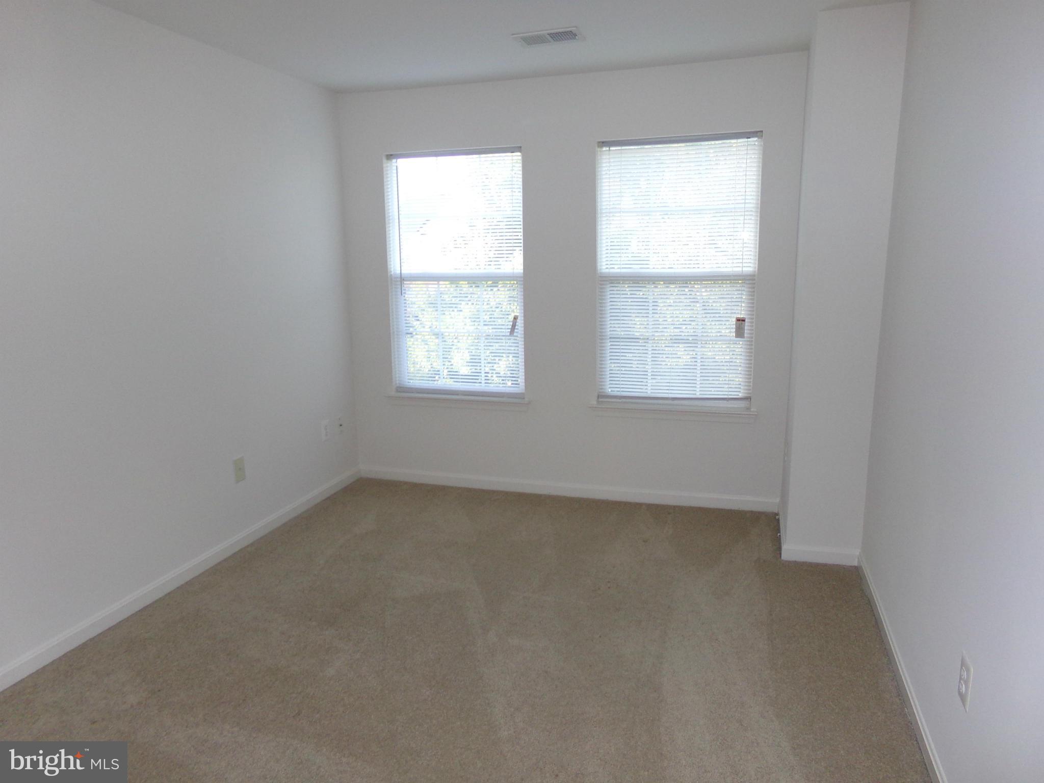 9834 Farm Pond Road Laurel, MD 20708 - Photo 24 of 30 an empty room with a window