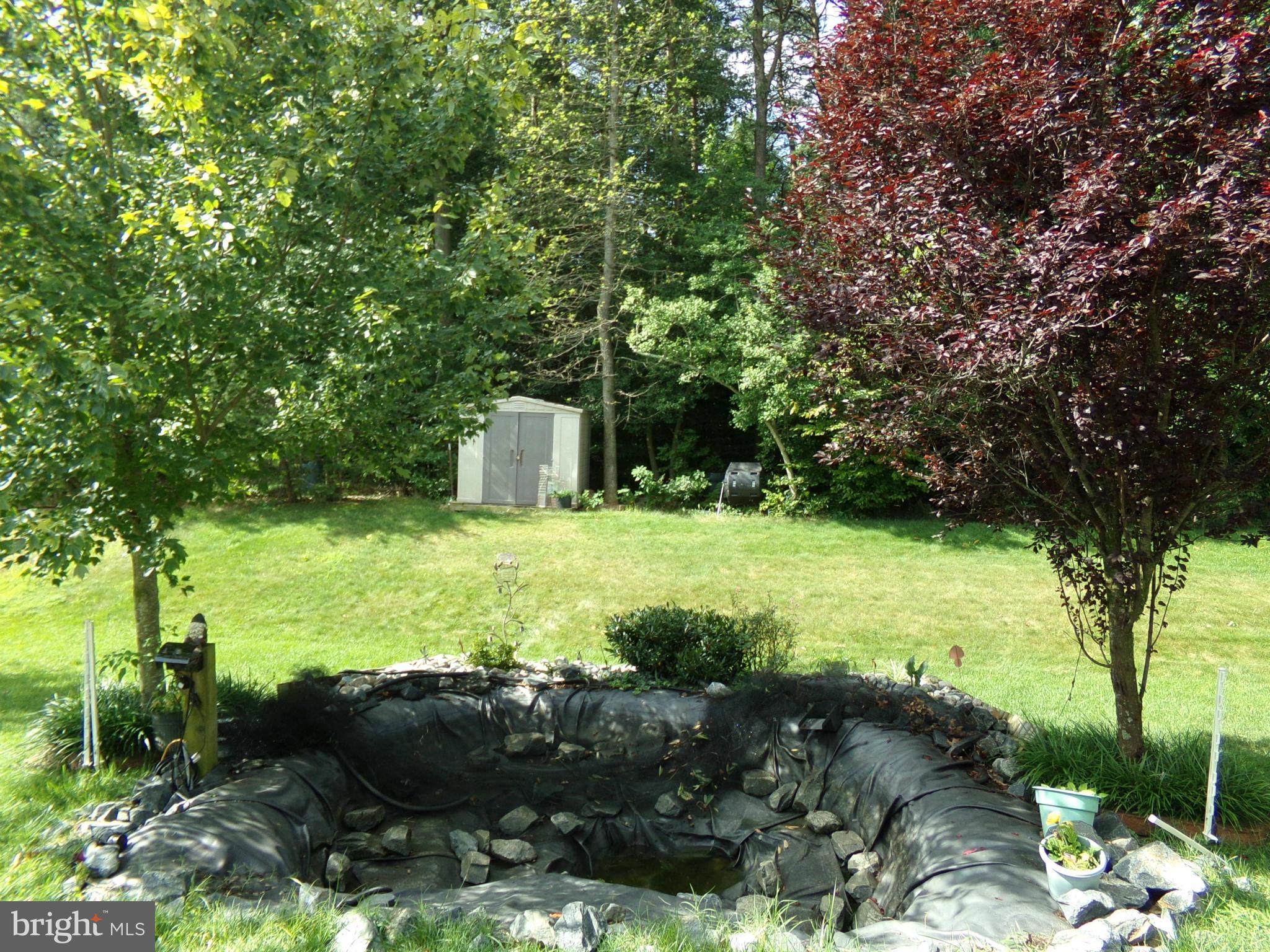 9834 Farm Pond Road Laurel, MD 20708 - Photo 8 of 30 a view of an outdoor space