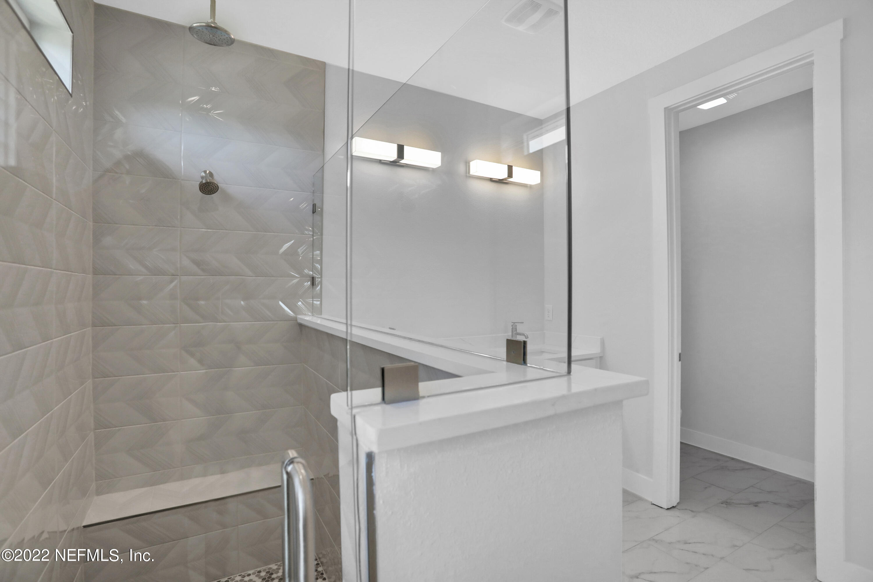 278 Farmfield Drive St. Augustine, FL 32092 - Photo 29 of 36 a bathroom with a sink and a mirror