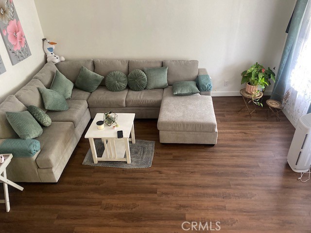 1665 North Fillmore Avenue Rialto, CA 92376 - Photo 18 of 23 a living room with furniture and wooden floor