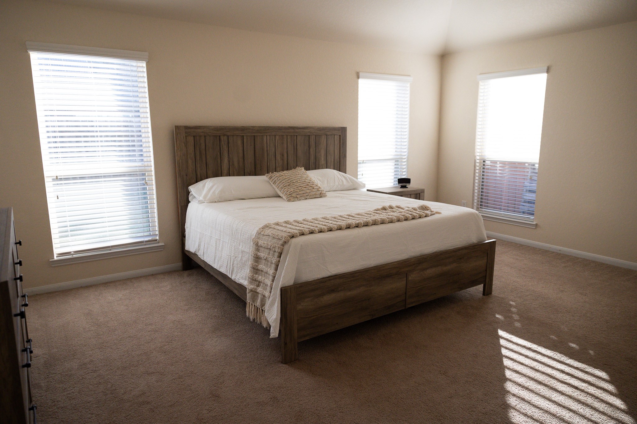 14550 Myers Drive Houston, TX 77090 - Photo 16 of 23 a bed sitting in a bedroom next to a window
