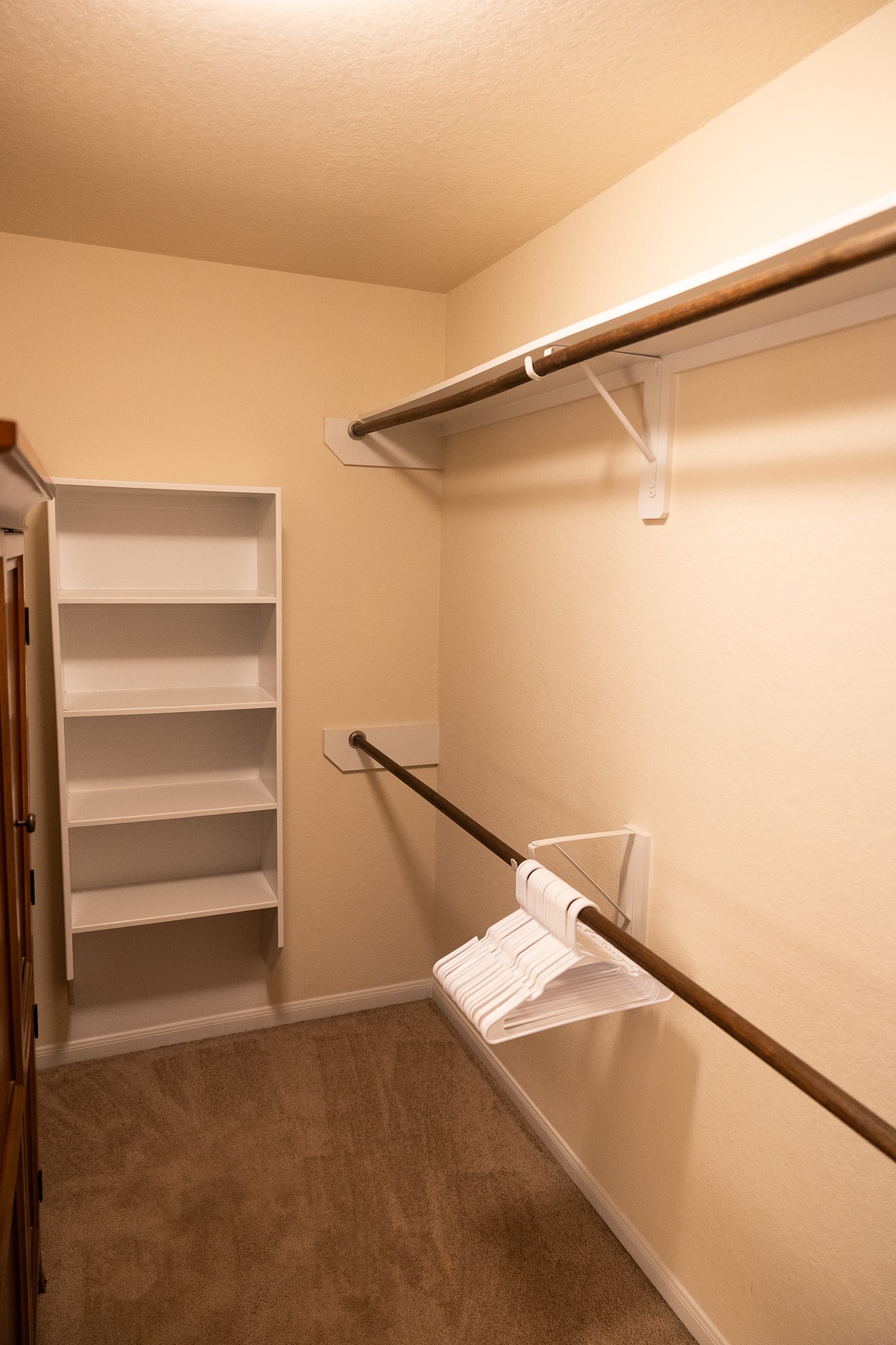 14550 Myers Drive Houston, TX 77090 - Photo 19 of 23 a view of an empty walk in closet