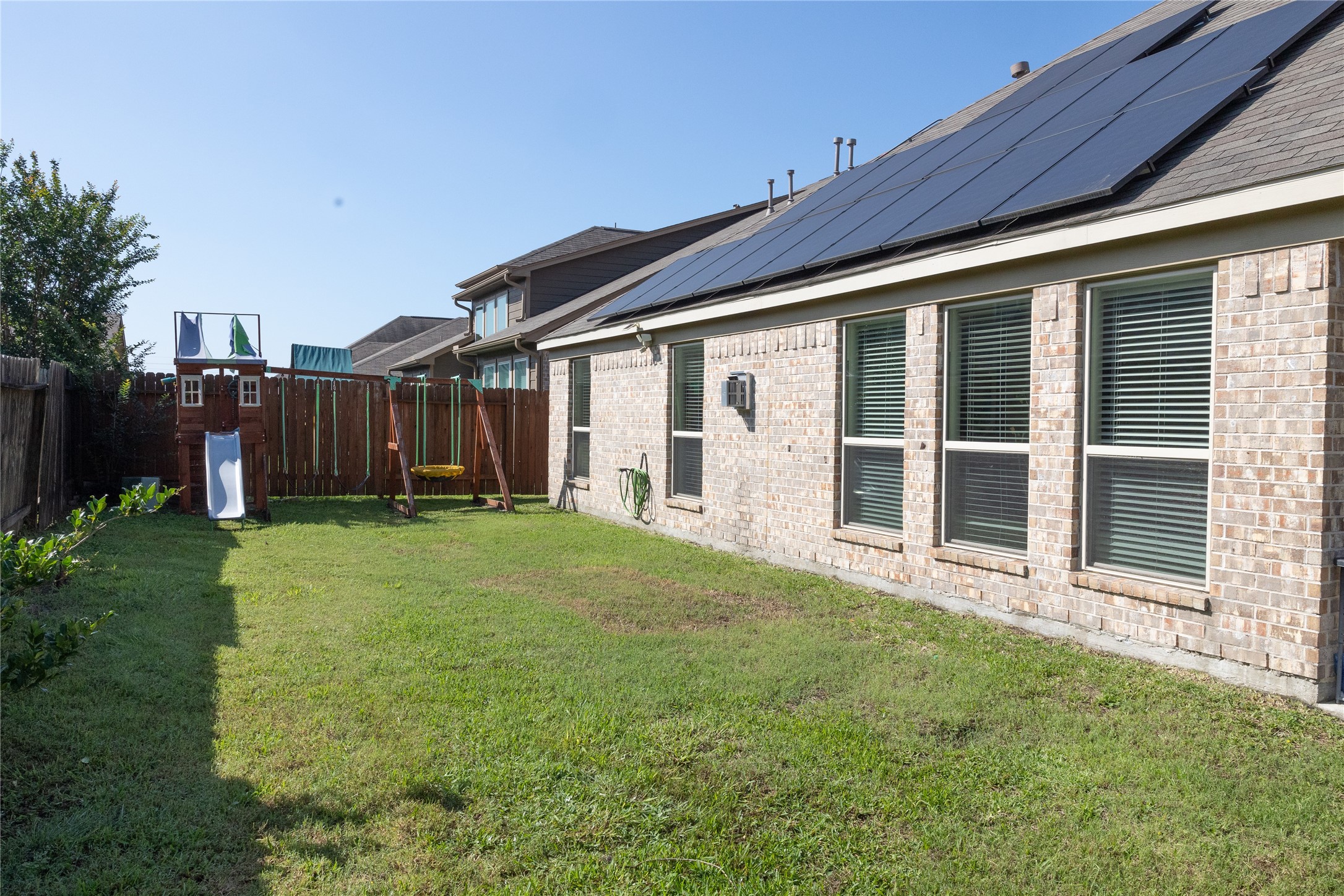 14550 Myers Drive Houston, TX 77090 - Photo 21 of 23 a view of a house with backyard and porch