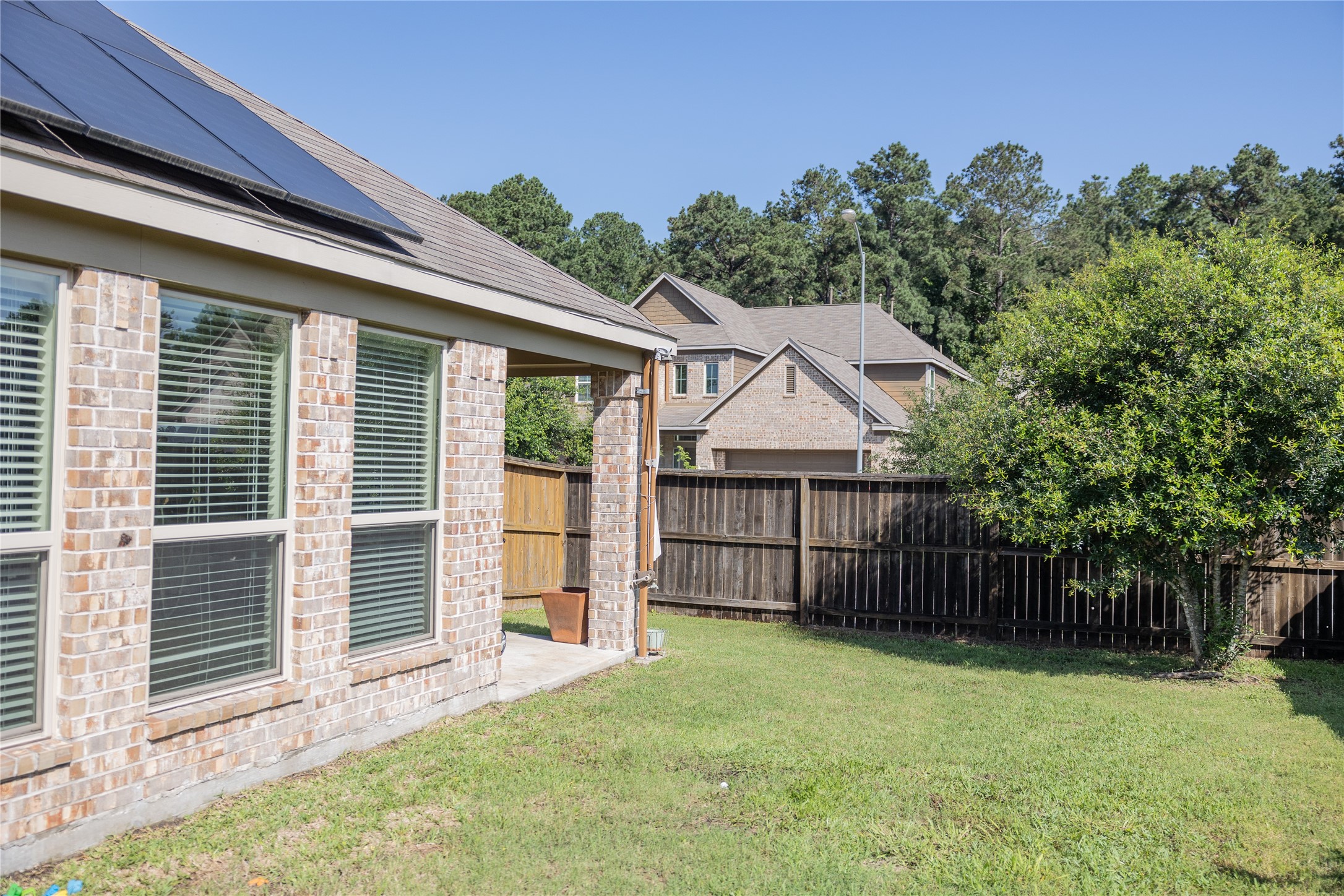 14550 Myers Drive Houston, TX 77090 - Photo 22 of 23 a view of backyard with green space