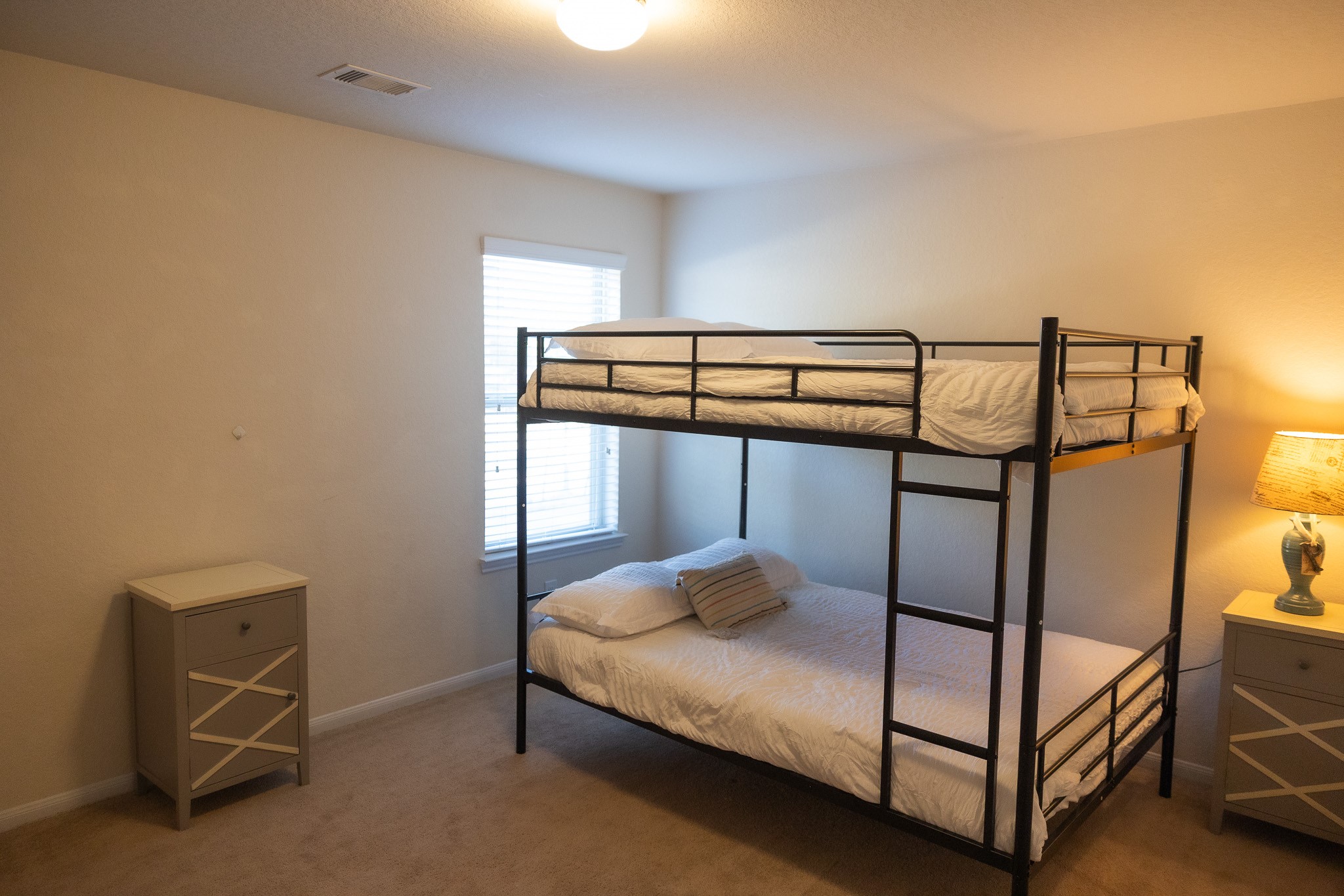 14550 Myers Drive Houston, TX 77090 - Photo 9 of 23 a bedroom with a bed and a window