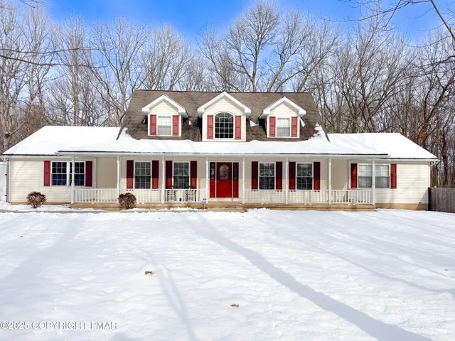 a kitchen with stainless steel appliances granite countertop a sink counter space and cabinets