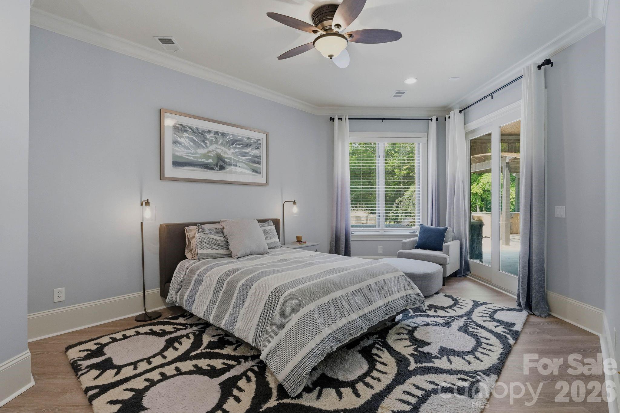 7416 Lee Rea Road Charlotte, NC 28226 - Photo 38 of 48 a bedroom with a bed and a window