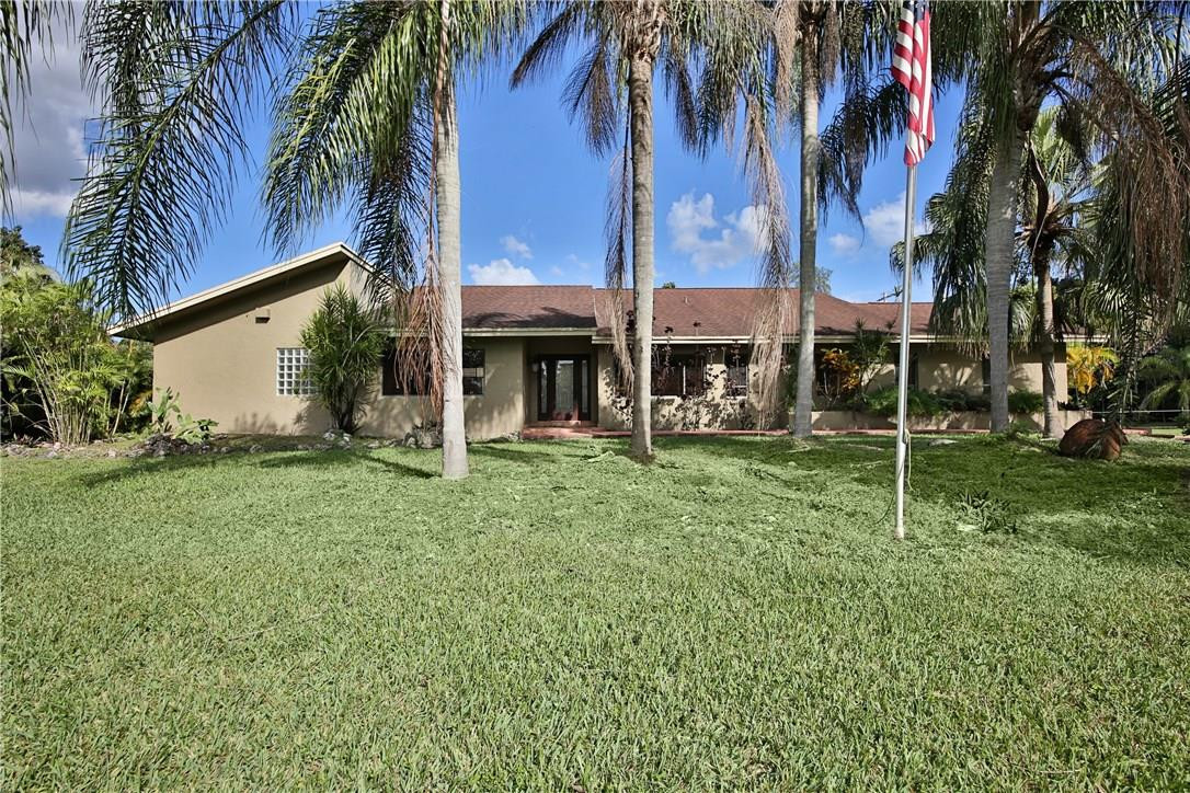 17901 Southwest 68th Court Southwest Ranches, FL 33331 - Photo 1 of 34 a view of a house with a yard