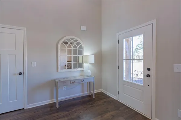a bathroom with double vanity sinks and a mirror