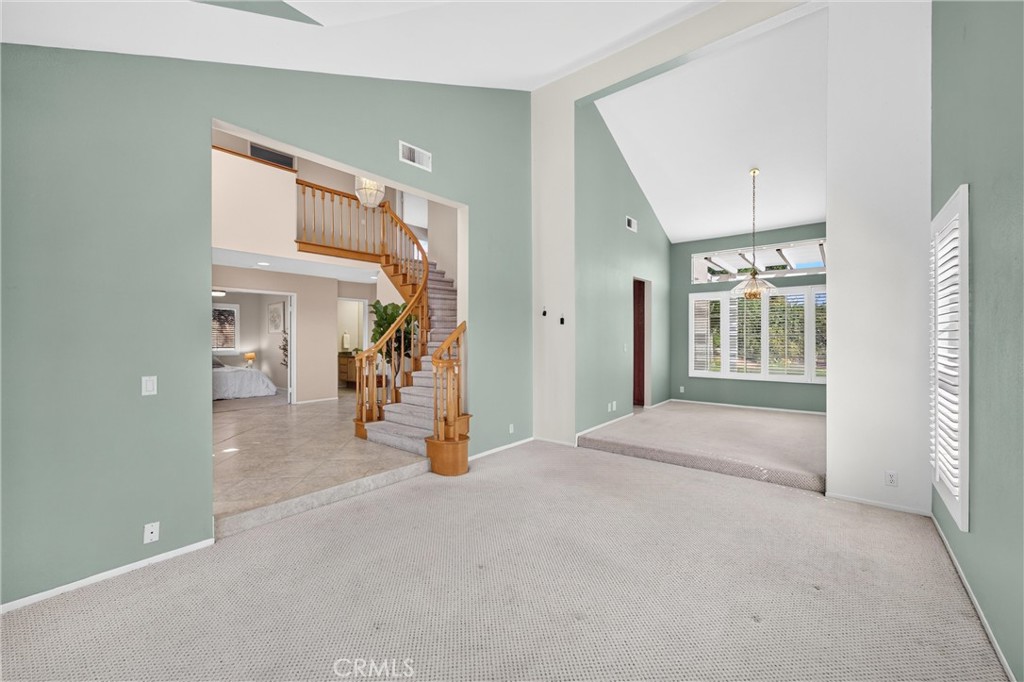 2000 Citrus Wood Lane Riverside, CA 92503 - Photo 9 of 51 Living Room to Dining Room. High Ceilings create a greater space.