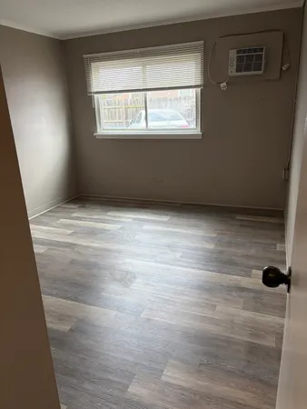 a view of empty room with a window