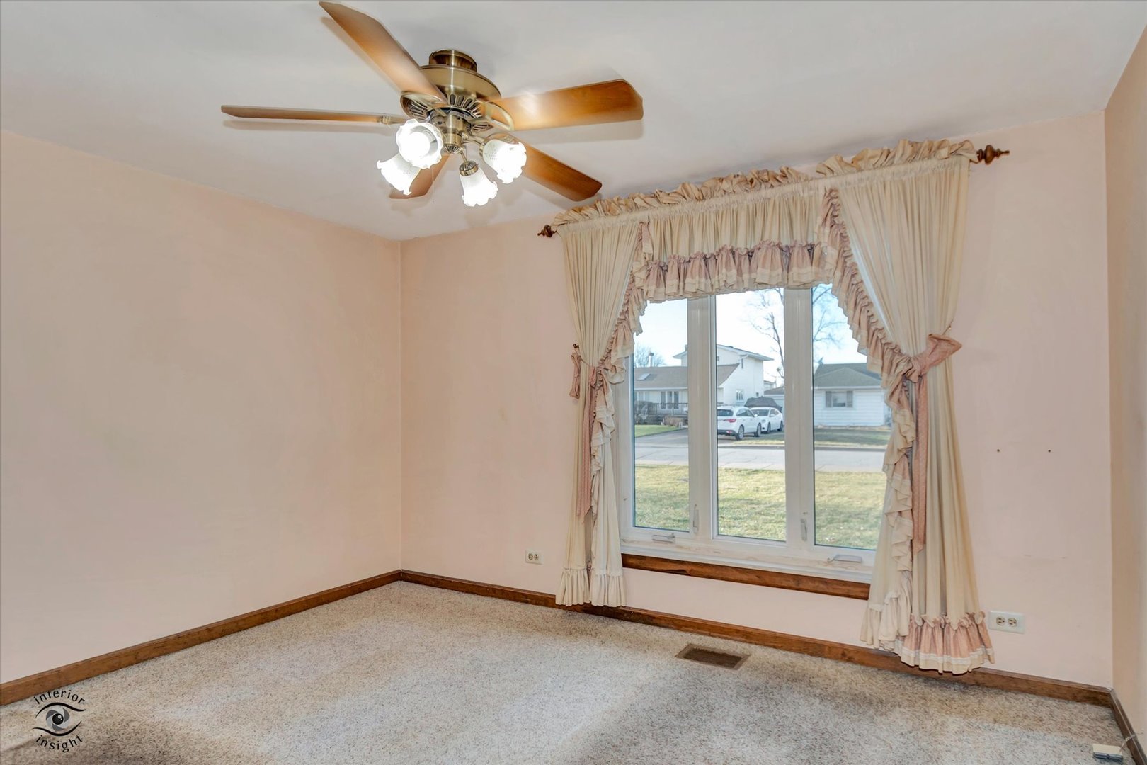 8859 South Main Street Hometown, IL 60456 - Photo 16 of 26 a view of an empty room with a window