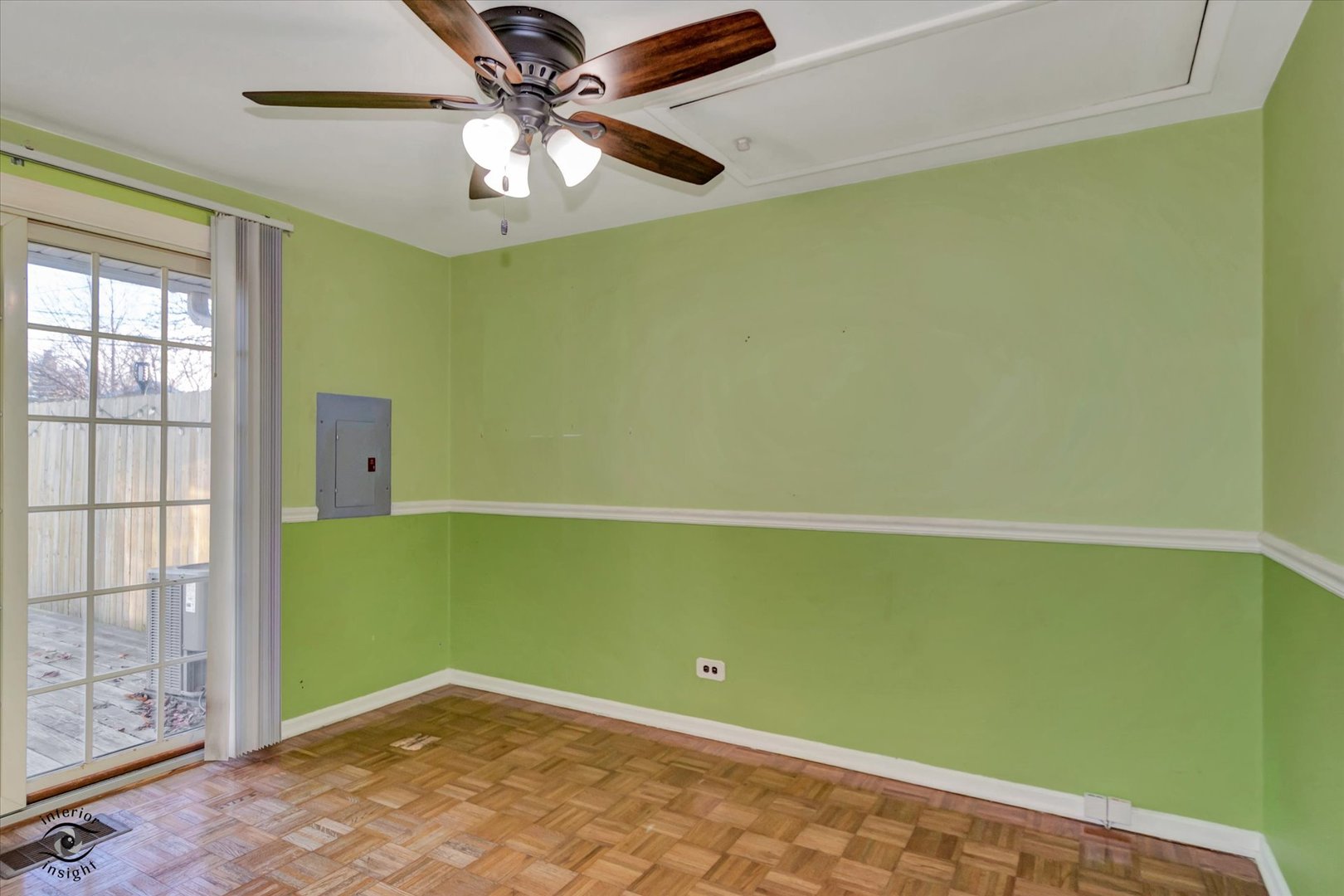 8859 South Main Street Hometown, IL 60456 - Photo 18 of 26 a view of a room with a ceiling fan and a window