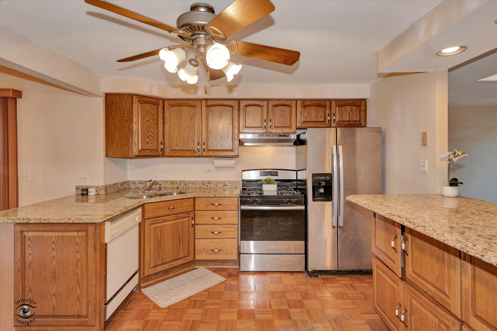 8859 South Main Street Hometown, IL 60456 - Photo 9 of 26 a kitchen with stainless steel appliances granite countertop a sink stove refrigerator and cabinets