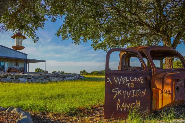 a view of swimming pool with outdoor seating and yard