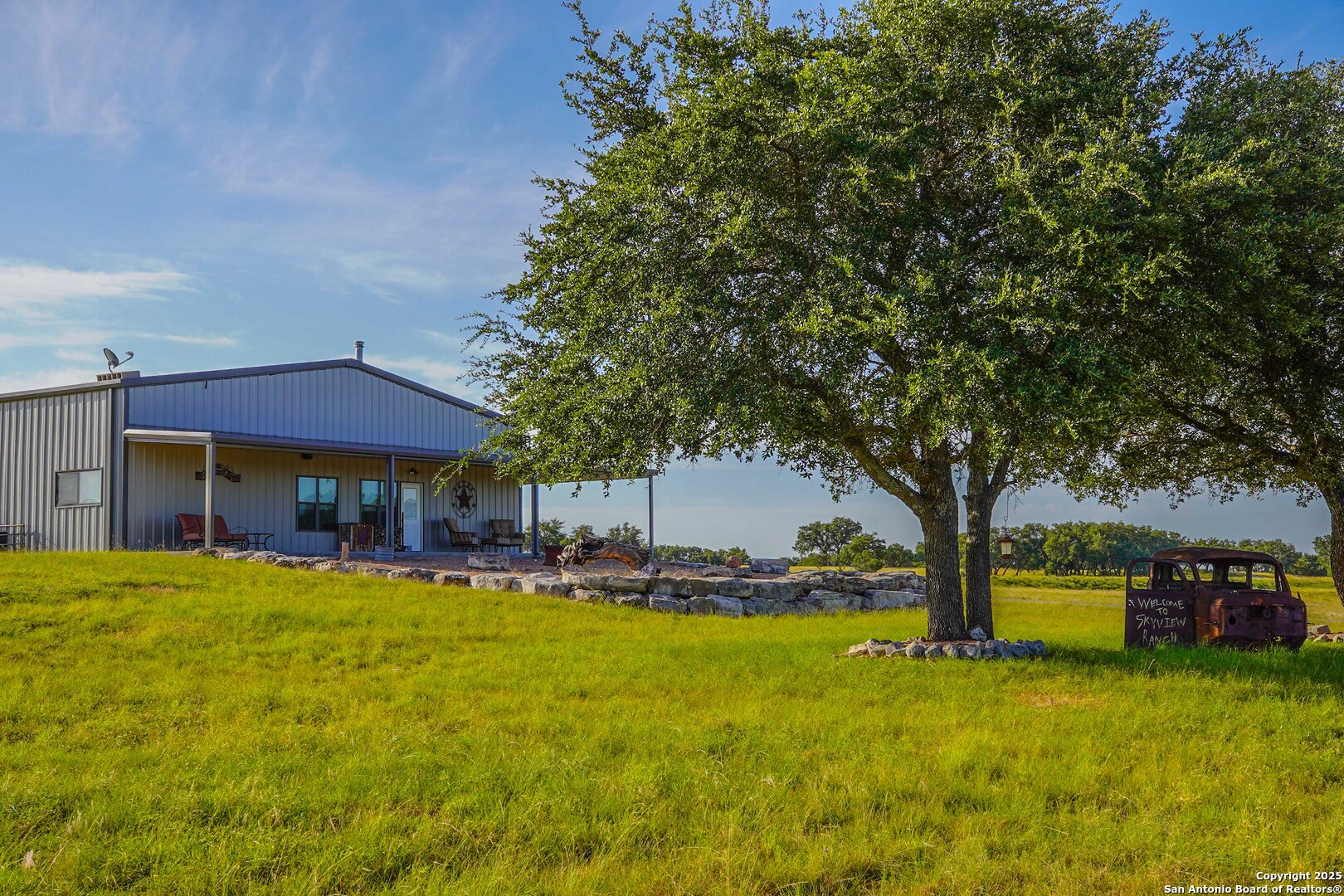 13105 Interstate 10 Service Road Junction, TX 76849 - Photo 14 of 82 a view of a house with pool and sitting area