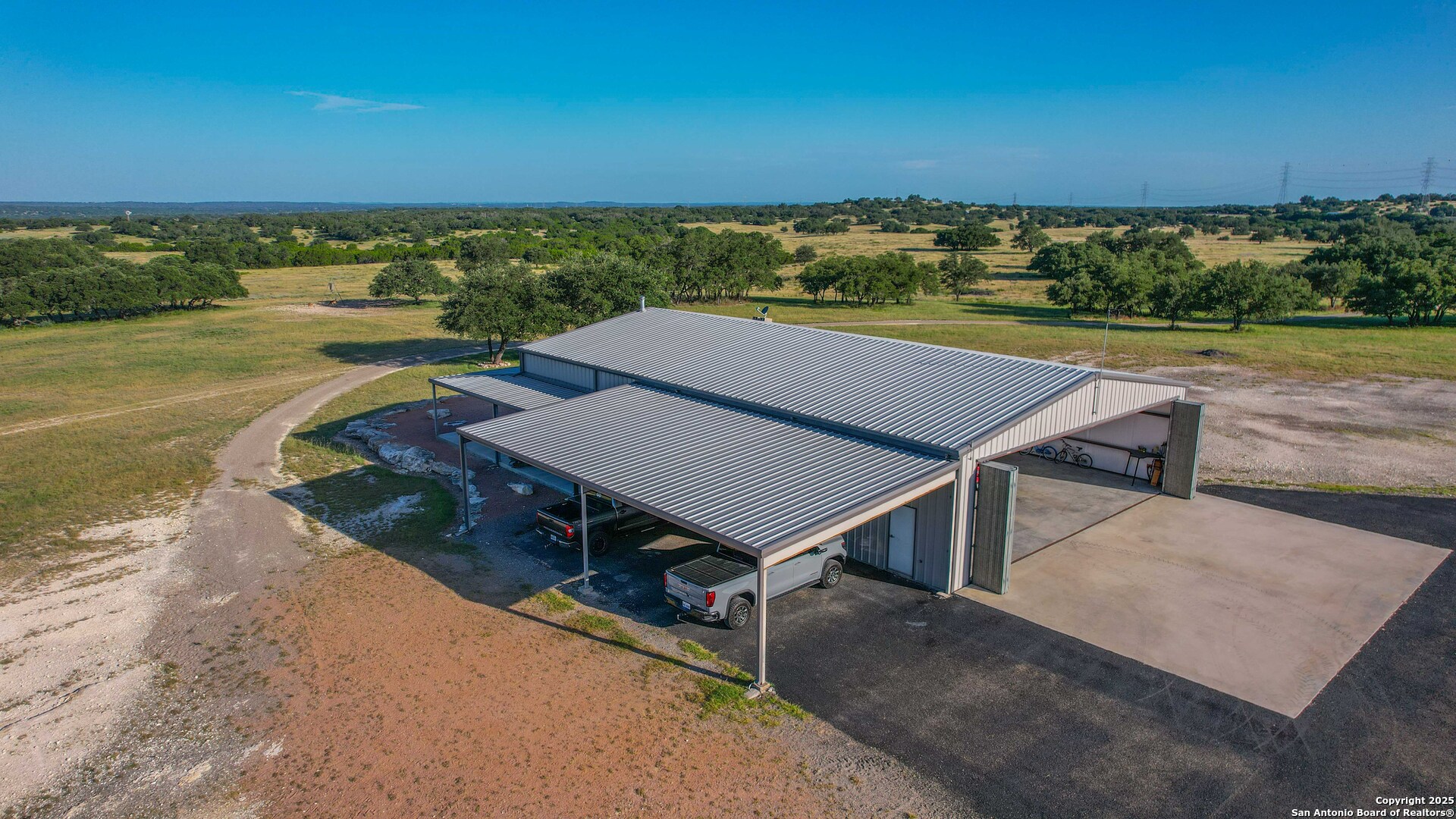 13105 Interstate 10 Service Road Junction, TX 76849 - Photo 27 of 82 an aerial view of a house with a outdoor space