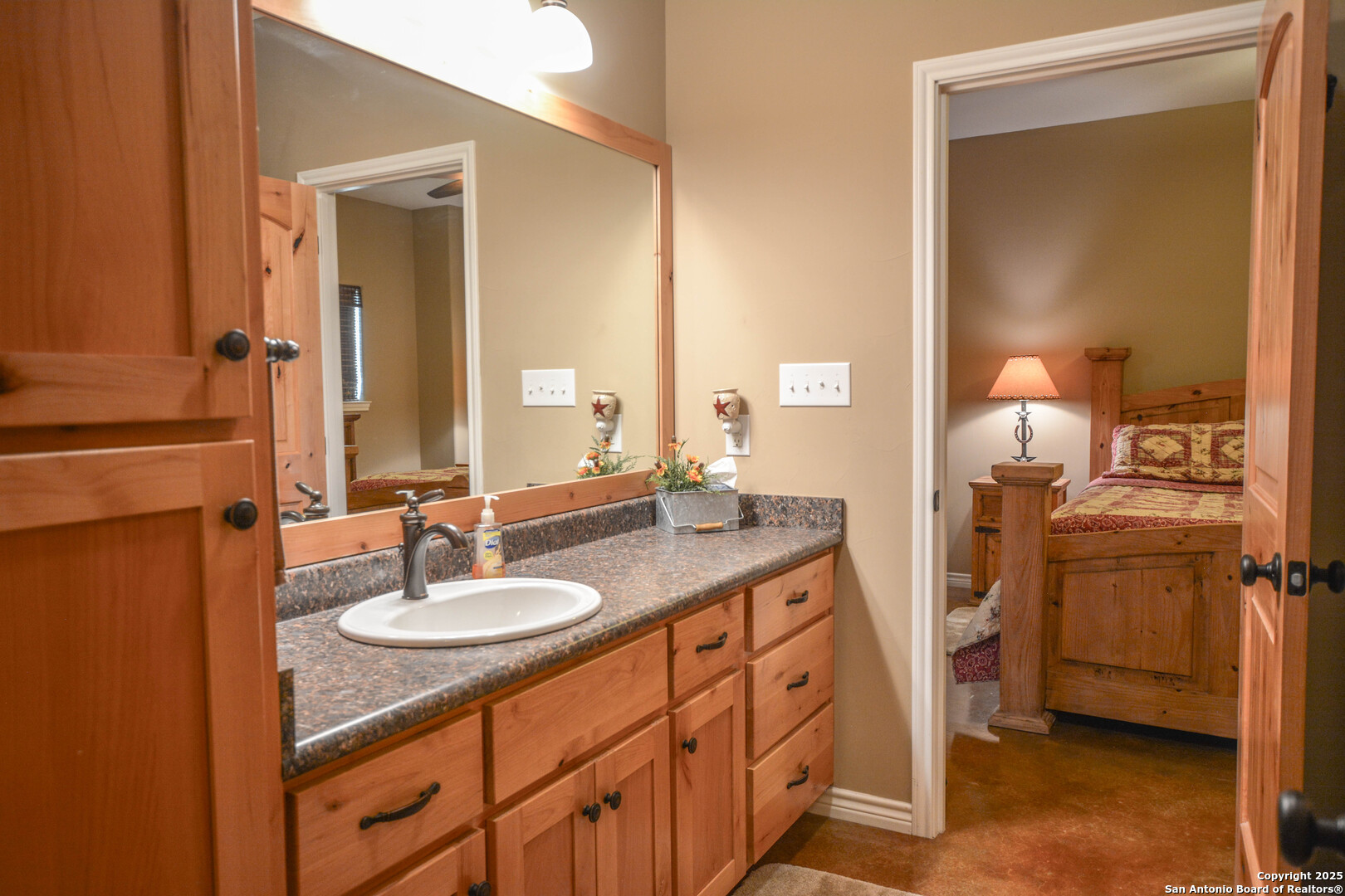 13105 Interstate 10 Service Road Junction, TX 76849 - Photo 35 of 82 a bathroom with a sink double vanity and a mirror