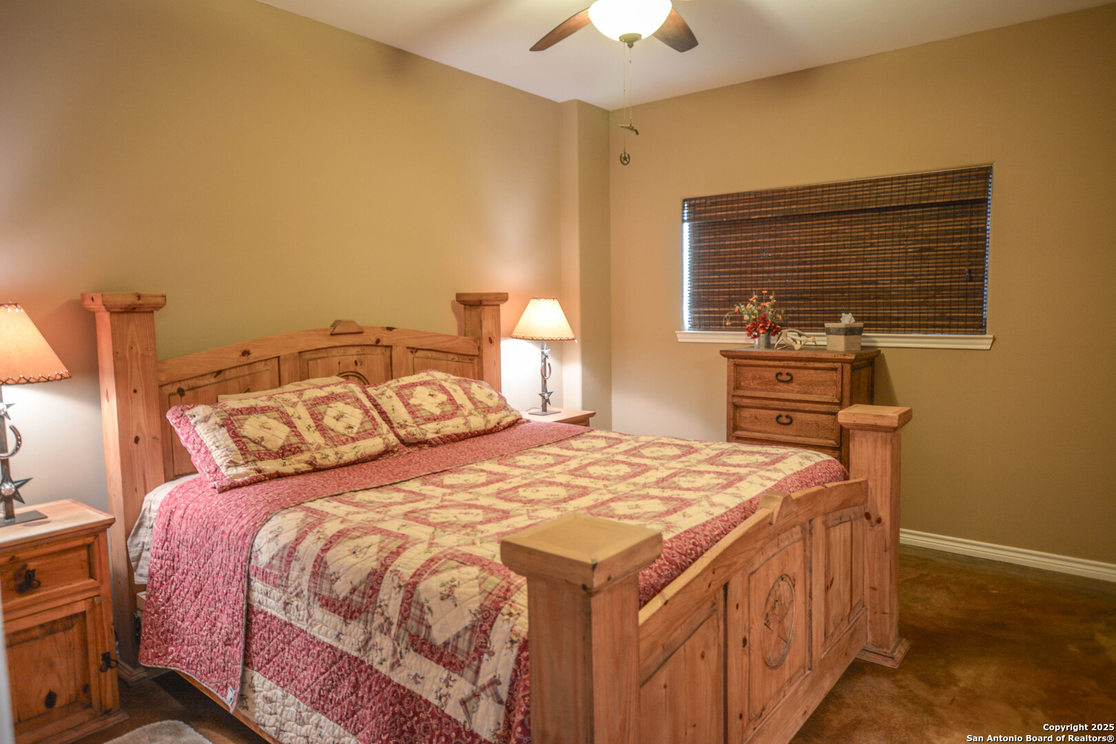 13105 Interstate 10 Service Road Junction, TX 76849 - Photo 36 of 82 a bedroom with a bed and a dresser
