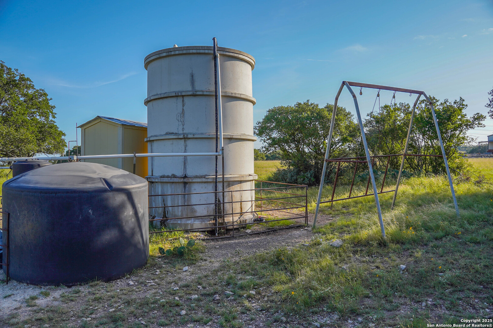 13105 Interstate 10 Service Road Junction, TX 76849 - Photo 69 of 82 a backyard of a house with barbeque oven and plants
