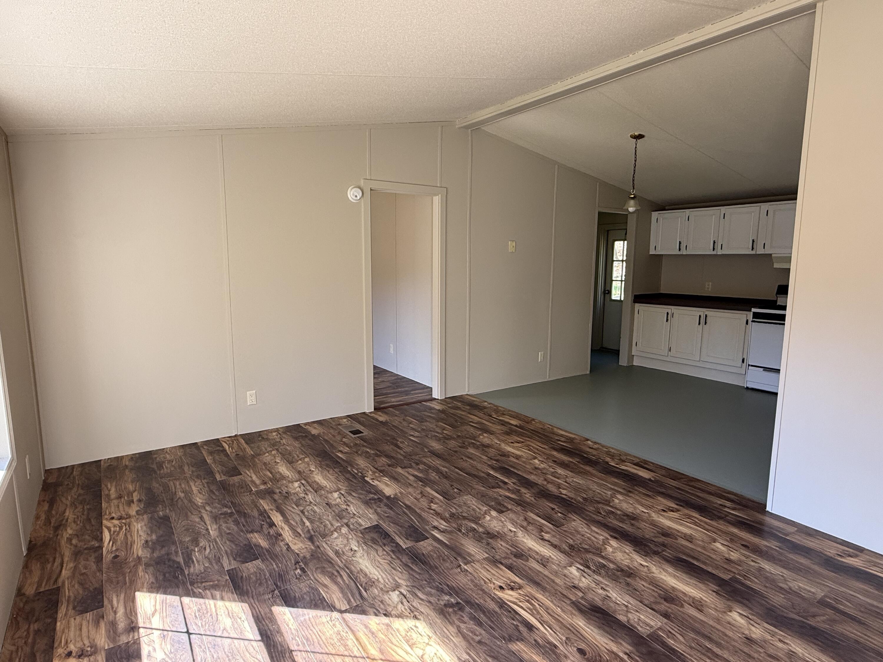 370 Oceanville Road Stonington, ME 04681 - Photo 2 of 12 Living room to kitchen
