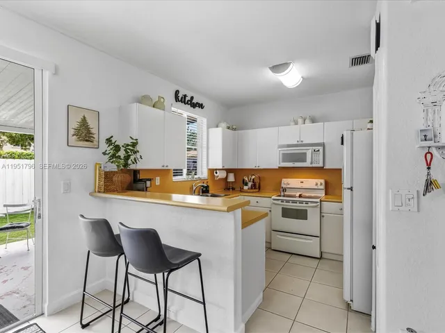 $349,000 | 7377 Northwest 174th Terrace, Unit 105, Hialeah, FL 33015