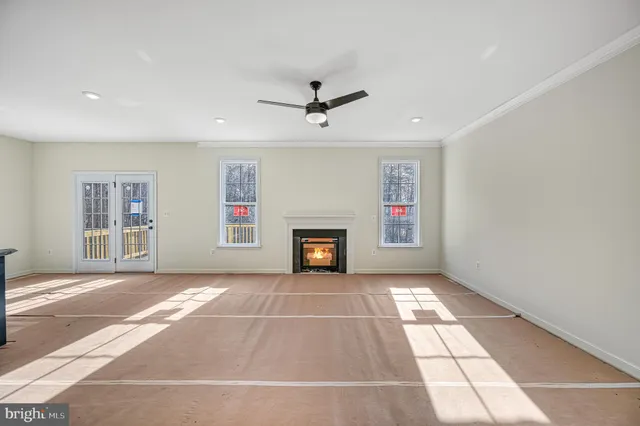 a view of a hallway with staircase