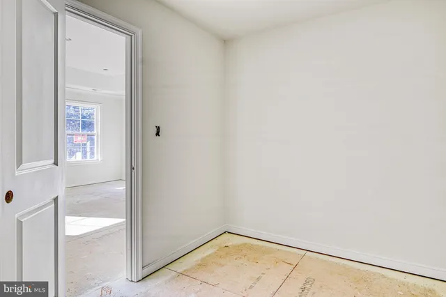 a view of an empty room and window