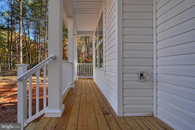a kitchen with stainless steel appliances granite countertop a sink and a stove