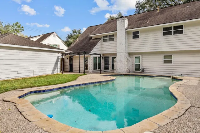 a view of a house with pool
