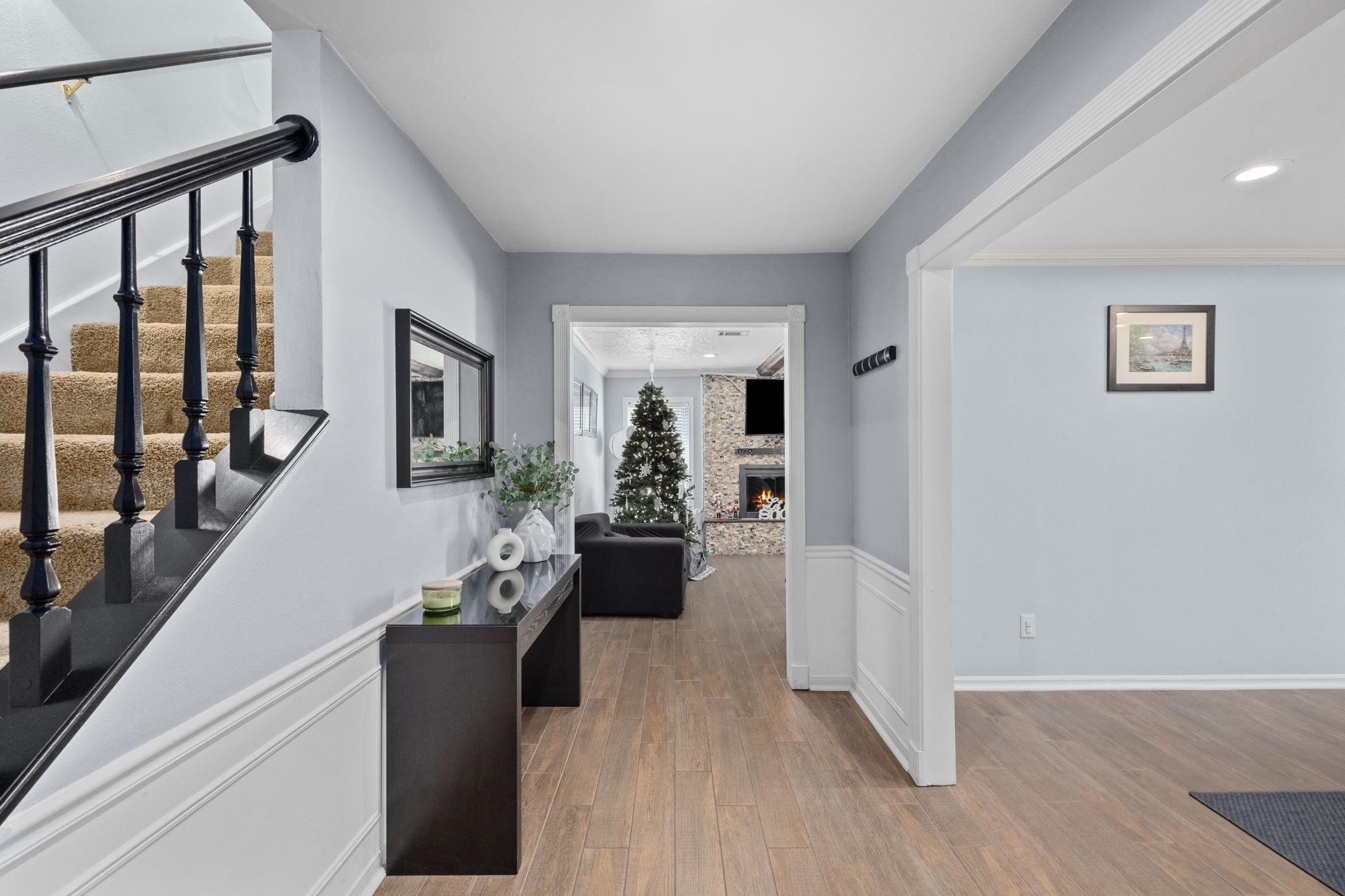 827 Thicket Lane Houston, TX 77079 - Photo 5 of 31 a living room with furniture and wooden floor