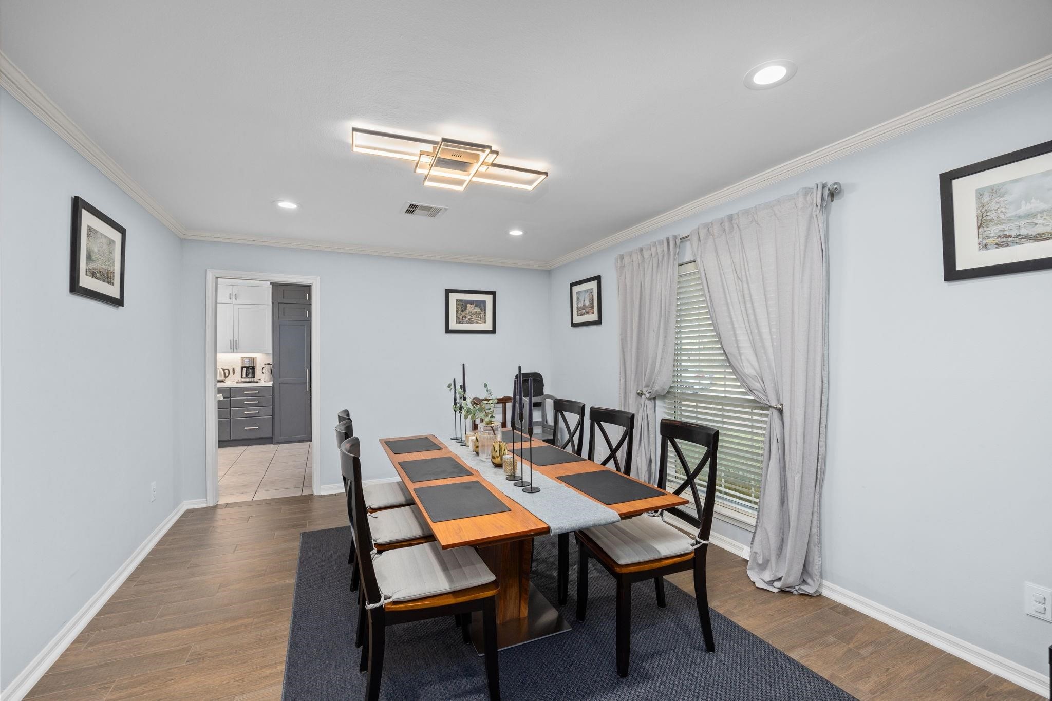 827 Thicket Lane Houston, TX 77079 - Photo 6 of 31 a dining room with furniture and window