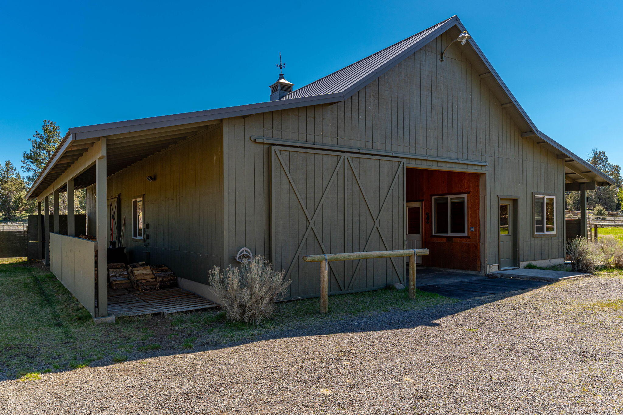 17375 Jordan Road Sisters, OR 97759 - Photo 56 of 63 4 stall barn with turn outs, tack room, and storage.